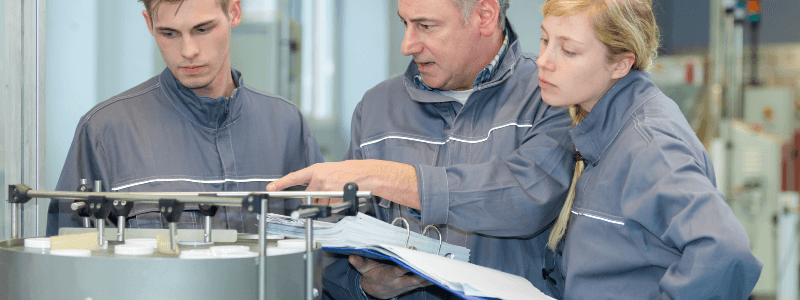 Engineers working with seal design tools for new equipment