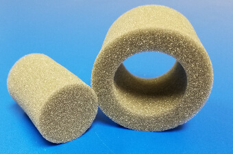 Light gray open-cell foam tube and cylinder fabricated by Web Seal